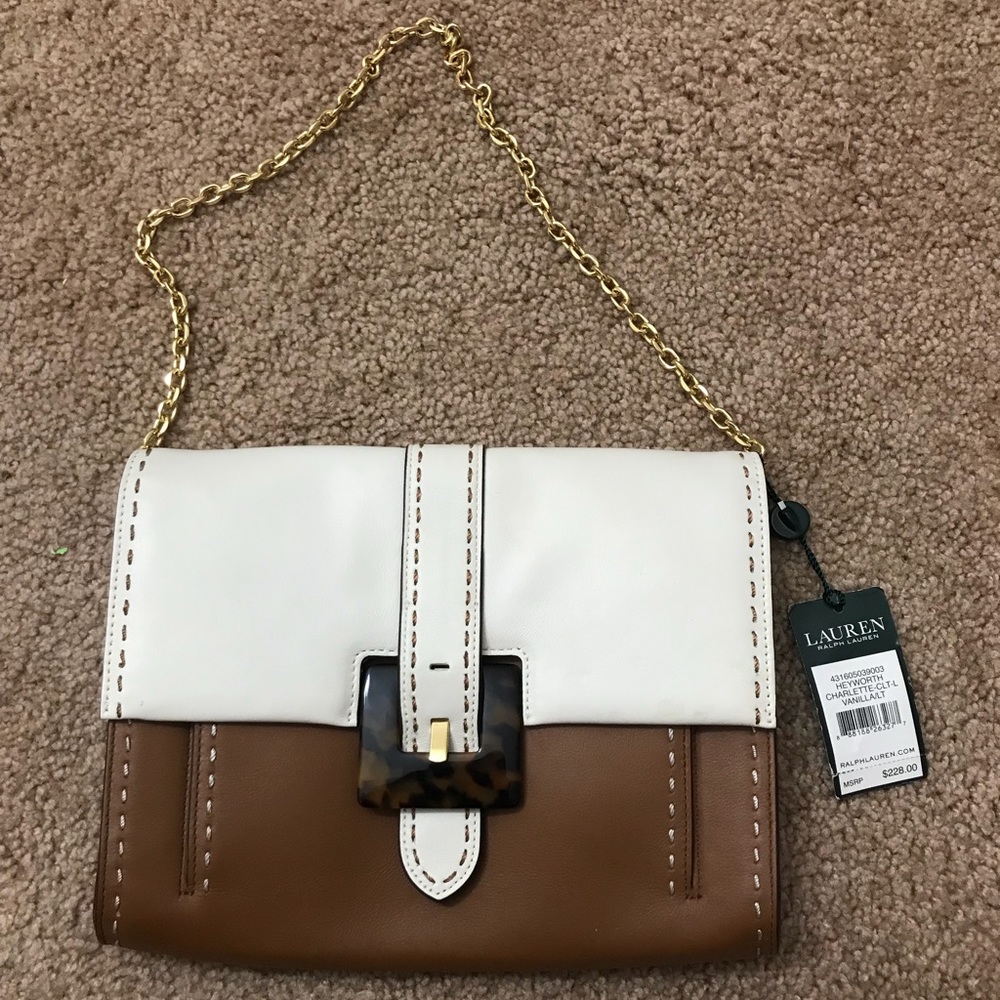 Ralph Lauren Wristlet. Comes with dust bag.